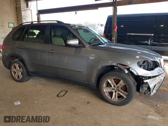2012 BMW X5 35d with VIN 5UXZW0C59CL673416, listed as a IAAI auction lot 41910233 with 70,008 mi miles and . Bid and sale history available at DreamBid. Image 1.
