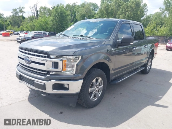 2018 Ford F-150 XL with VIN 1FTEW1E57JFA95086, listed as a IAAI auction lot 42574704 with 77,301 mi miles and . Bid and sale history available at DreamBid. Image 18.