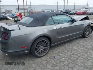 2013 Ford Mustang V6 with VIN 1ZVBP8EM8D5248243, listed as a IAAI auction lot 42429803 with 130,099 mi miles and . Bid and sale history available at DreamBid. Image 4.