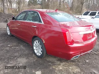 2014 Cadillac CTS Luxury AWD with VIN 1G6AX5S38E0146872, listed as a IAAI auction lot 41663642 with 56,787 mi miles and . Bid and sale history available at DreamBid. Image 3.