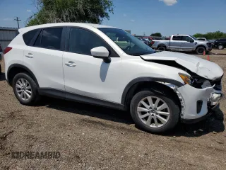 2014 Mazda CX-5 Touring with VIN JM3KE2CY9E0305244, listed as a Copart auction lot 56205605 with 164,516 mi miles and Salvage Title. Bid and sale history available at DreamBid. Image 4.