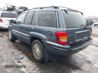 2004 Jeep Grand Cherokee Limited with VIN 1J8GW58J14C139431, listed as a IAAI auction lot 41519523 with 130,398 mi miles and . Bid and sale history available at DreamBid. Image 3.
