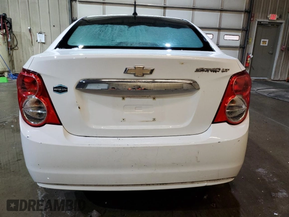 2013 Chevrolet Sonic LT with VIN 1G1JC5SB8D4164658, listed as a Copart auction lot 47059365 with 105,985 mi miles and Salvage Title. Bid and sale history available at DreamBid. Image 6.
