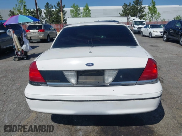 1999 Ford Crown Victoria Police с VIN 2FAFP71W1XX200937, выставлен на аукционе IAAI как лот 41977836 с пробегом 186 379 миль миль и . История ставок и продаж доступна на DreamBid. Изображение 13.