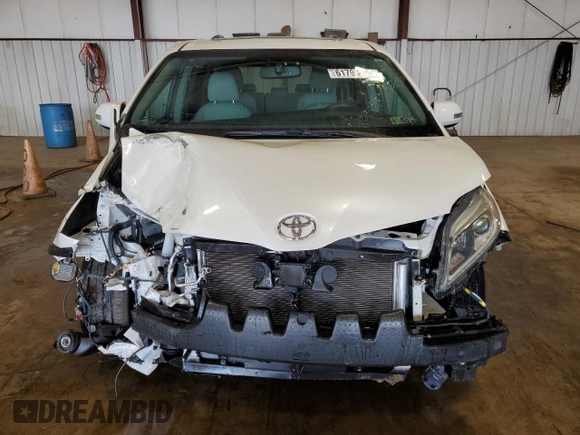 2015 Toyota Sienna XLE with VIN 5TDYK3DC4FS688299, listed as a Copart auction lot 61793155 with 57,197 mi miles and Salvage title. Bid and sale history available at DreamBid. Image 5.