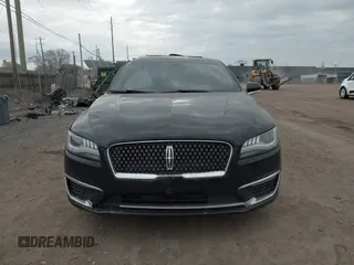 2017 Lincoln MKZ Reserve z VIN 3LN6L5E9XHR649804, wystawiony jako IAAI lot #41906488 z przebiegiem 161 150 mil mil oraz . Historia ofert i sprzedaży dostępna na DreamBid. Obrazek 12.