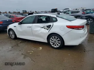 2016 Kia Optima EX with VIN 5XXGU4L31GG097296, listed as a Copart auction lot 74909523 with 79,450 mi miles and Salvage Title. Bid and sale history available at carsss.com. Image 2.