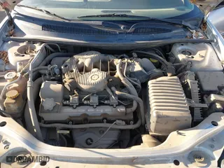 2001 Chrysler Sebring LXi with VIN 1C3EL55U91N660200, listed as a IAAI auction lot 41631756 with 124,867 mi miles. Bid and sale history available at carsss.com. Image 10.
