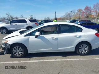 2012 Honda Civic LX with VIN 19XFB2F54CE348155, listed as a IAAI auction lot 42064540 with 238,636 mi miles and . Bid and sale history available at DreamBid. Image 14.