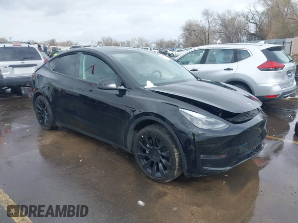 2023 Tesla Model Y Long Range with VIN 7SAYGDEE5PF766685, listed as a IAAI auction lot 41933729 with 25,959 mi miles and . Bid and sale history available at DreamBid. Image 1.