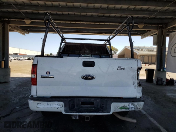 2004 Ford F-150 STX с VIN 1FTRX12W44NA47003, выставлен на аукционе Copart как лот 61133075 с пробегом 258 417 миль миль и Списание • Salvage title. История ставок и продаж доступна на DreamBid. Изображение 6.
