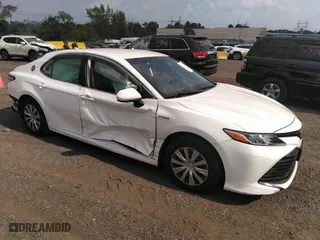 2020 Toyota Camry Hybrid LE with VIN 4T1C31AK2LU518579, listed as a IAAI auction lot 39981154 with 115,005 mi miles. Bid and sale history available at carsss.com. Image 1.