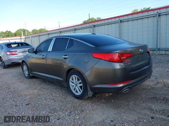 2011 Kia Optima LX with VIN KNAGM4A74B5085319, listed as a IAAI auction lot 42061665 with 224,517 mi miles and . Bid and sale history available at carsss.com. Image 3.