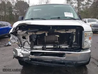 2011 Ford Econoline Wagon XL with VIN 1FBSS3BL4BDA66921, listed as a IAAI auction lot 41443103 with 143,518 mi miles. Bid and sale history available at carsss.com. Image 13.