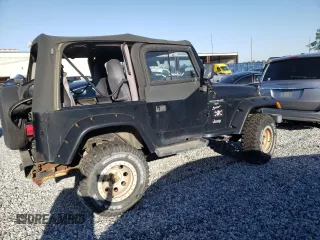1999 Jeep Wrangler Sport with VIN 1J4FY19S6XP483793, listed as a Copart auction lot 49443725 with 118,225 mi miles and Clean Title. Bid and sale history available at carsss.com. Image 3.