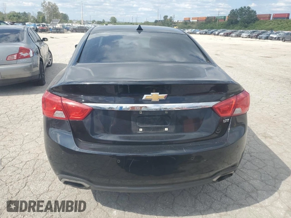 2014 Chevrolet Impala LTZ with VIN 1G1155S38EU169167, listed as a Copart auction lot 73174254 with 156,884 mi miles and Salvage Title. Bid and sale history available at DreamBid. Image 6.