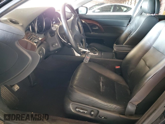 2005 Acura RL z VIN JH4KB16575C011187, wystawiony jako Copart lot #60276655 z przebiegiem 107 378 mil mil oraz Szkoda całkowita • Salvage title. Historia ofert i sprzedaży dostępna na DreamBid. Obrazek 7.
