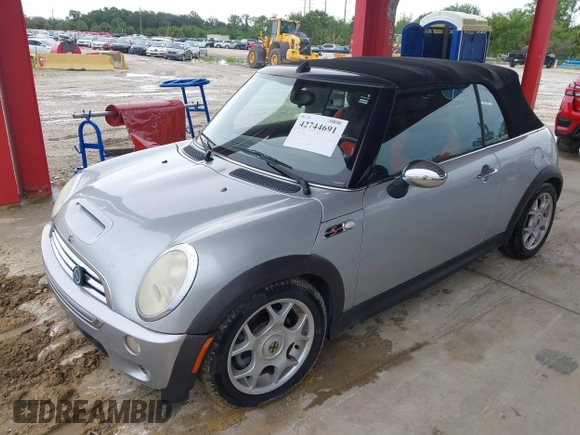 2006 MINI Convertible S with VIN WMWRH33556TL93023, listed as a IAAI auction lot 42744691 with 128,192 mi miles and . Bid and sale history available at DreamBid. Image 2.