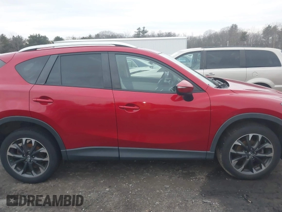 2016 Mazda CX-5 Grand Touring with VIN JM3KE4DY6G0740347, listed as a IAAI auction lot 41101437 with 81,586 mi miles. Bid and sale history available at carsss.com. Image 14.