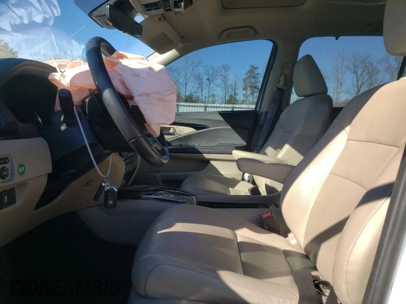 2021 Honda Pilot Touring 8-Passenger with VIN 5FNYF5H94MB001855, listed as a Copart auction lot 87891185 with 55,097 mi miles and Salvage Title. Bid and sale history available at DreamBid. Image 7.