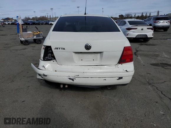 2002 Volkswagen Jetta GL с VIN 3VWRK69M52M024396, выставлен на аукционе Copart как лот 45539355 с пробегом 142 880 миль миль и Списание • Salvage title. История ставок и продаж доступна на DreamBid. Изображение 6.