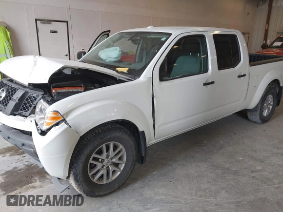 2018 Nissan Frontier SV z VIN 1N6DD0FV7JN718221, wystawiony jako IAAI lot #42118492 z przebiegiem 132 413 mil mil oraz . Historia ofert i sprzedaży dostępna na DreamBid. Obrazek 2.