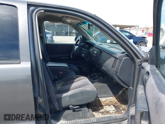 2001 Dodge Dakota z VIN 1B7HL2AX51S333575, wystawiony jako IAAI lot #41782582 z przebiegiem 291 640 mil mil oraz . Historia ofert i sprzedaży dostępna na DreamBid. Obrazek 5.