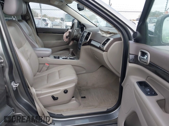 2012 Jeep Grand Cherokee Laredo with VIN 1C4RJFAG8CC298268, listed as a IAAI auction lot 40787833 with 206,486 mi miles. Bid and sale history available at carsss.com. Image 5.