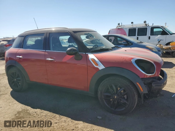 2014 MINI Countryman with VIN WMWZB3C5XEWR42035, listed as a Copart auction lot 61846725 with 105,131 mi miles and Salvage title. Bid and sale history available at DreamBid. Image 4.