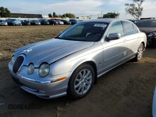 2000 Jaguar S-Type V8 with VIN SAJDA01DXYGL32550, listed as a Copart auction lot 85166464 with 300,394 mi miles and Clean Title. Bid and sale history available at DreamBid. Image 1.