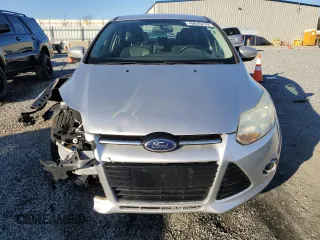 2013 Ford Focus Titanium with VIN 1FADP3J29DL148611, listed as a Copart auction lot 49645215 with 104,904 mi miles and Salvage Title. Bid and sale history available at carsss.com. Image 5.