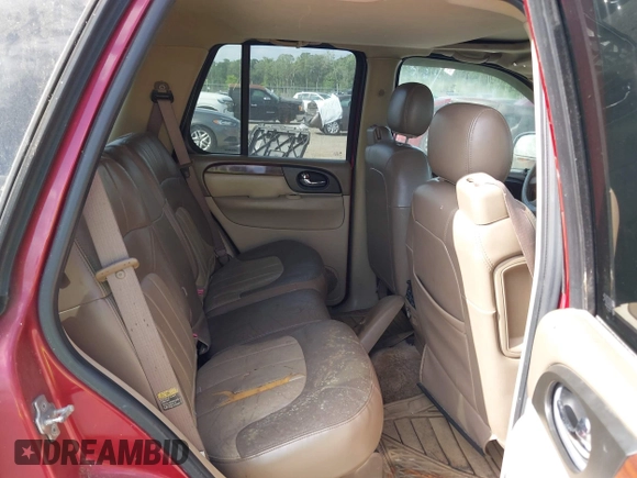 2004 GMC Envoy SLT with VIN 1GKDS13SX42334503, listed as a IAAI auction lot 42038781 with 242,680 mi miles. Bid and sale history available at carsss.com. Image 8.