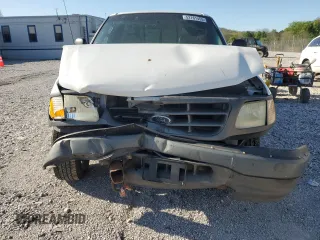2002 Ford F-150 XL with VIN 1FTRF17W92NB67419, listed as a Copart auction lot 52761455 with 100,305 mi miles and Salvage Title. Bid and sale history available at carsss.com. Image 5.