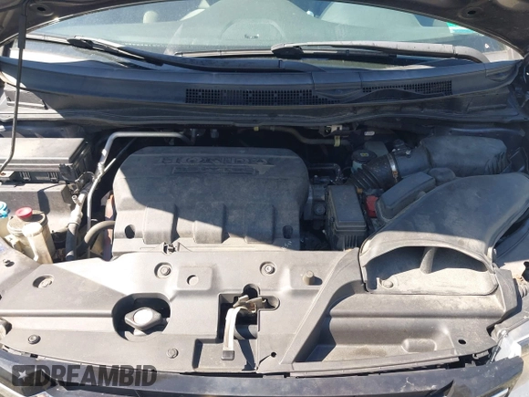 2016 Honda Odyssey SE with VIN 5FNRL5H39GB048487, listed as a IAAI auction lot 42059132 with 140,411 mi miles and . Bid and sale history available at DreamBid. Image 10.
