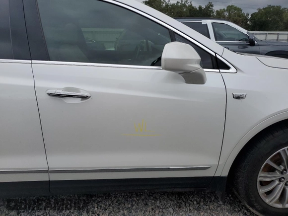 2019 Cadillac XT5 Luxury FWD z VIN 1GYKNCRS6KZ271427, wystawiony jako Copart lot #58873725 z przebiegiem Nie podano mil oraz Szkoda całkowita • Salvage title. Historia ofert i sprzedaży dostępna na DreamBid. Obrazek 13.