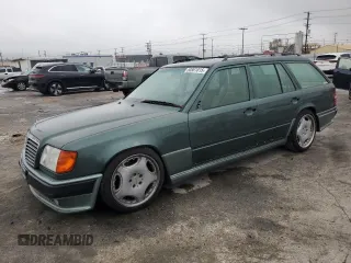 1993 Mercedes-Benz 300 with VIN WDBEA92E7PF259851, listed as a Copart auction lot 50561015 with 214,346 mi miles and Salvage Title. Bid and sale history available at DreamBid. Image 1.