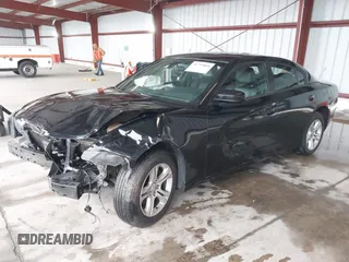 2020 Dodge Charger SXT with VIN 2C3CDXBG0LH211627, listed as a IAAI auction lot 41793868 with 104,587 mi miles and . Bid and sale history available at DreamBid. Image 2.