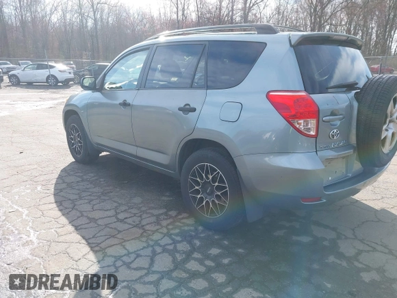 2007 Toyota RAV4 with VIN JTMBK33V976011985, listed as a IAAI auction lot 42035029 with 139,317 mi miles. Bid and sale history available at carsss.com. Image 3.