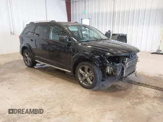2016 Dodge Journey Crossroad Plus z VIN 3C4PDCGB6GT107739, wystawiony jako IAAI lot #41973252 z przebiegiem 142 713 mil mil oraz . Historia ofert i sprzedaży dostępna na DreamBid. Obrazek 1.