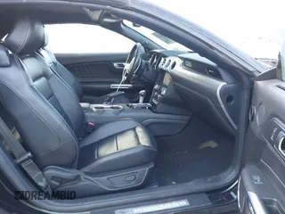 2021 Ford Mustang EcoBoost with VIN 1FATP8UH6M5103235, listed as a IAAI auction lot 40711543 with 52,470 mi miles. Bid and sale history available at carsss.com. Image 5.