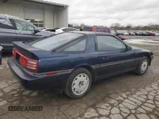 1988 Toyota Supra z VIN JT2MA71J0J0087102, wystawiony jako Copart lot #78730904 z przebiegiem 83 787 mil mil oraz Czysty tytuł • Clean title. Historia ofert i sprzedaży dostępna na DreamBid. Obrazek 3.