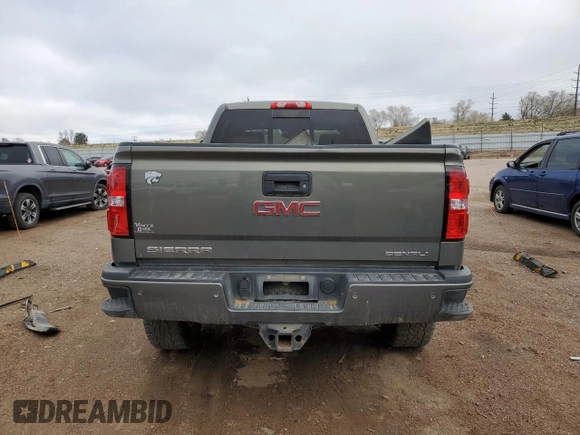 2018 GMC Sierra 2500HD Denali z VIN 1GT12UEY4JF128650, wystawiony jako Copart lot #51102895 z przebiegiem 131 010 mil mil oraz Szkoda całkowita • Salvage title. Historia ofert i sprzedaży dostępna na DreamBid. Obrazek 6.