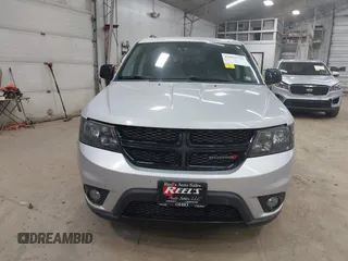 2013 Dodge Journey SXT with VIN 3C4PDCBBXDT661479, listed as a IAAI auction lot 42055731 with 151,963 mi miles. Bid and sale history available at carsss.com. Image 6.