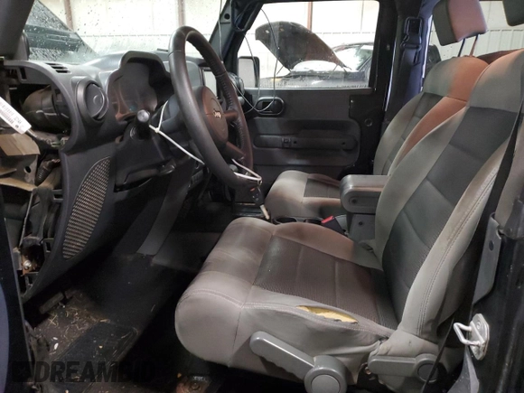 2010 Jeep Wrangler Rubicon with VIN 1J4BA6D10AL106213, listed as a Copart auction lot 86306184 with 180,825 mi miles and Clean title. Bid and sale history available at DreamBid. Image 7.