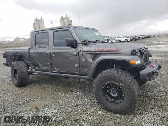 2021 Jeep Gladiator Sport S with VIN 1C6JJTAG0ML508141, listed as a Copart auction lot 48890065 with 44,583 mi miles and Salvage title. Bid and sale history available at DreamBid. Image 4.