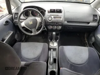 2007 Honda Fit z VIN JHMGD38457S012962, wystawiony jako Copart lot #55927755 z przebiegiem 172 153 mil mil oraz Szkoda całkowita • Salvage title. Historia ofert i sprzedaży dostępna na DreamBid. Obrazek 8.