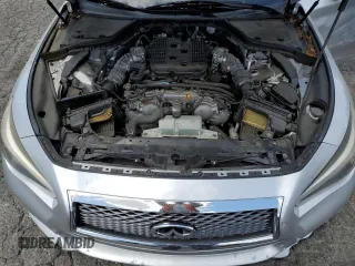 2015 Infiniti Q50 Premium z VIN JN1BV7AP6FM346086, wystawiony jako Copart lot #56973025 z przebiegiem 97 463 mil mil oraz Szkoda całkowita • Salvage title. Historia ofert i sprzedaży dostępna na DreamBid. Obrazek 11.
