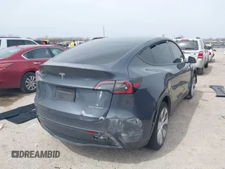 2023 Tesla Model Y Long Range with VIN 7SAYGDEE0PA036048, listed as a IAAI auction lot 41775845 with 41,291 mi miles. Bid and sale history available at carsss.com. Image 4.