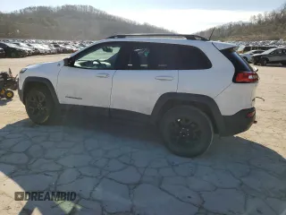 2016 Jeep Cherokee Trailhawk с VIN 1C4PJMBB2GW176413, выставлен на аукционе Copart как лот 48121595 с пробегом 120 715 миль миль и Списание • Salvage title. История ставок и продаж доступна на DreamBid. Изображение 2.