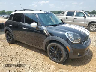 2012 MINI Countryman S with VIN WMWZC3C59CWL87444, listed as a Copart auction lot 59547785 with 147,814 mi miles and Salvage title. Bid and sale history available at DreamBid. Image 4.